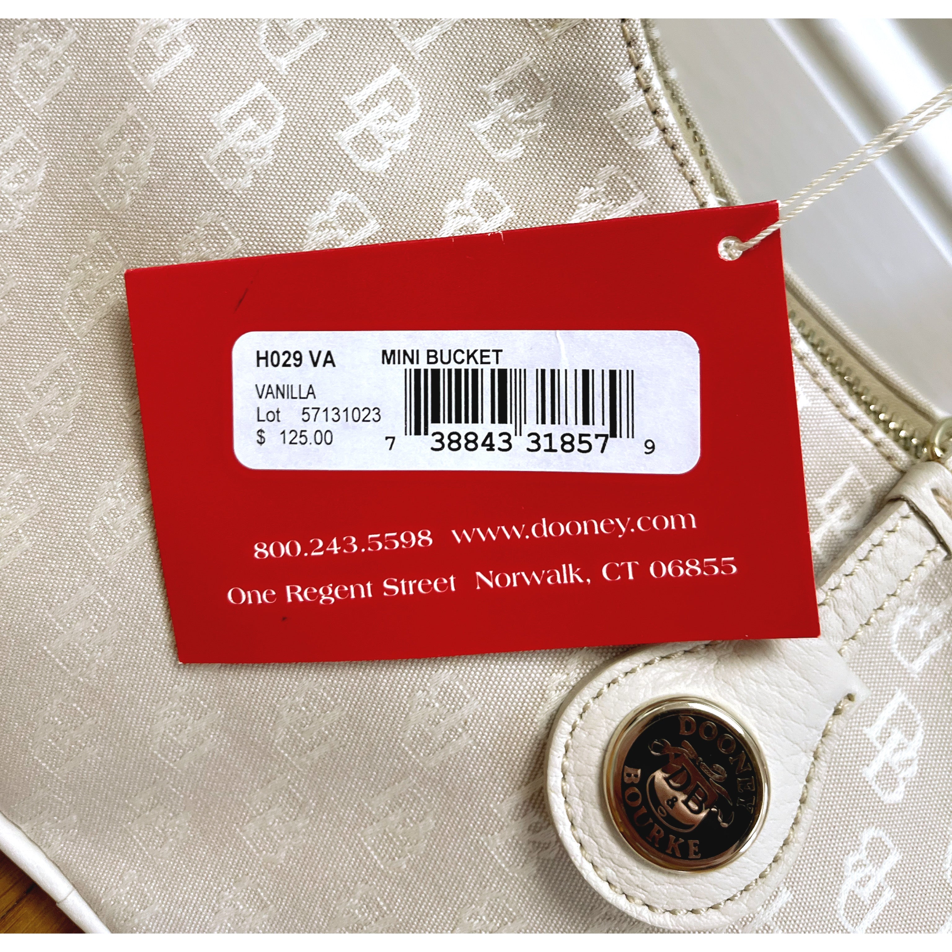 Dooney & Bourke cream Mini Bucket bag, NEW WITH TAGS!