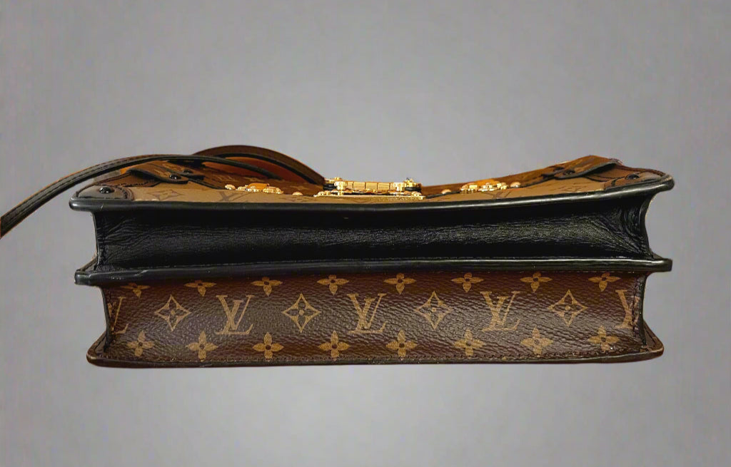 Louis Vuitton brown Trunk Clutch handbag