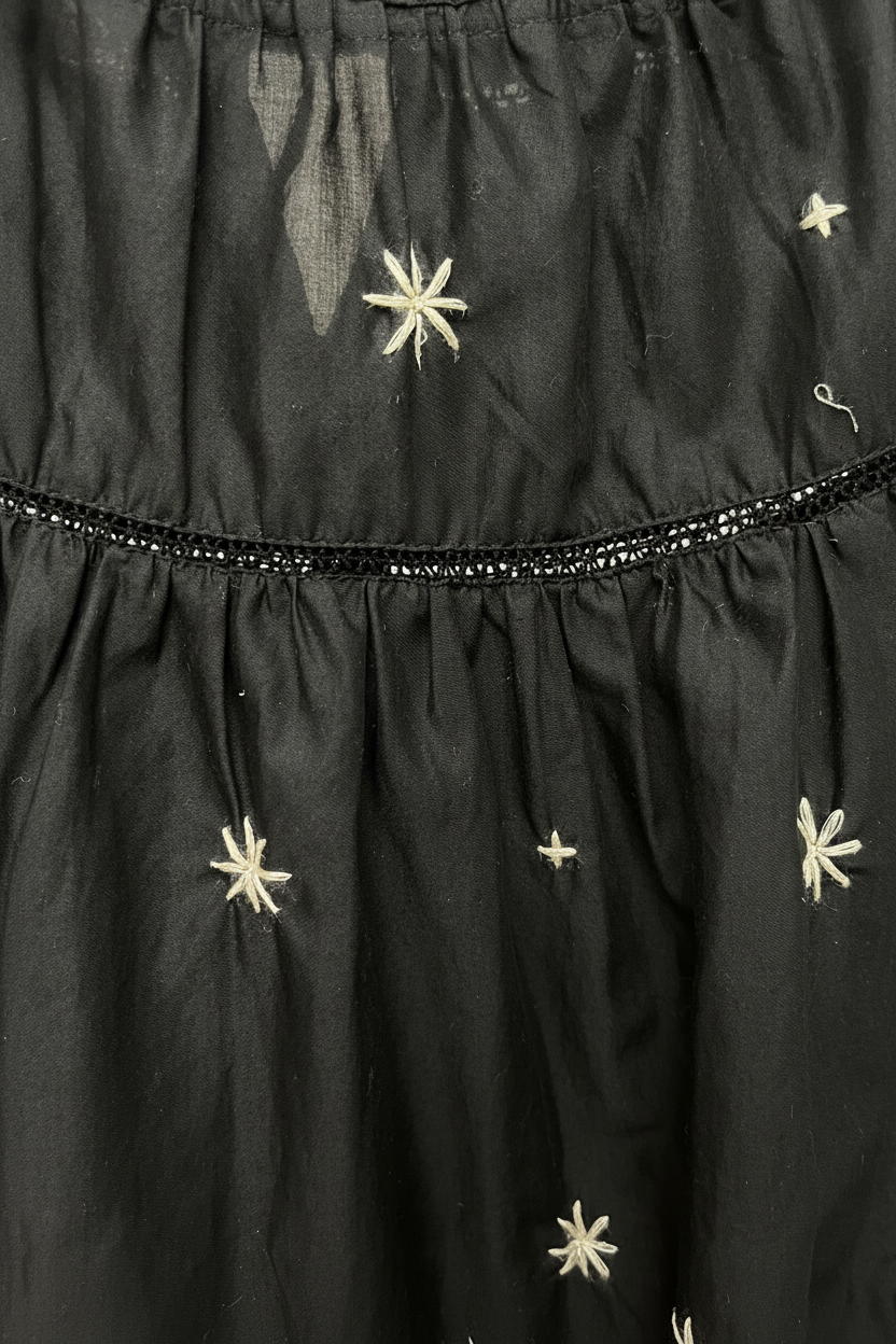 Merlette black Sol top with tan stars, size XS