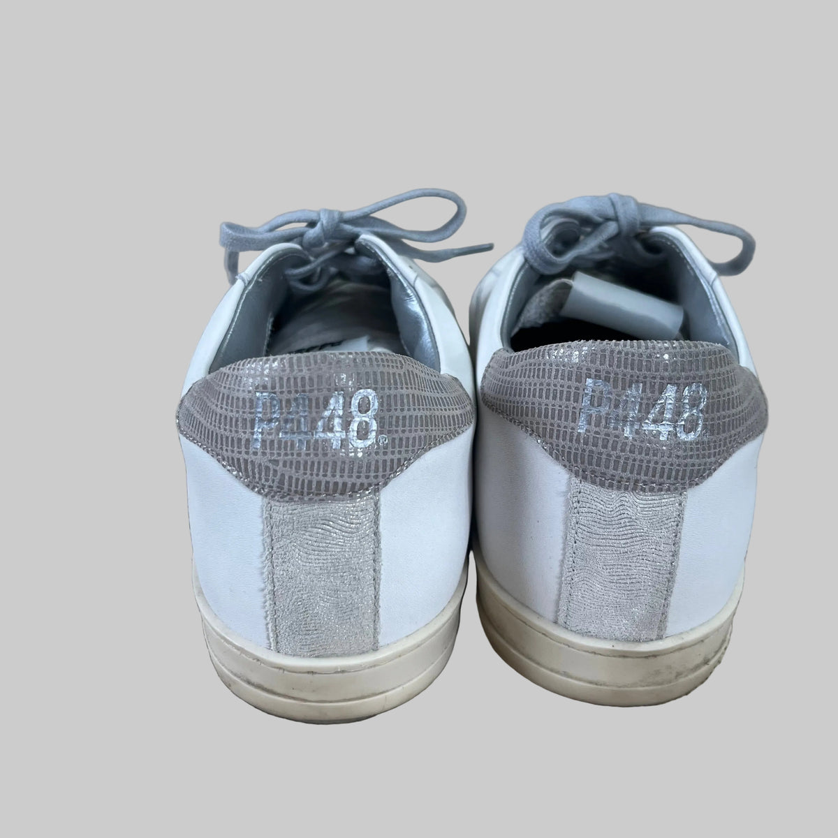 P448 white and platinum John sneakers, size 11