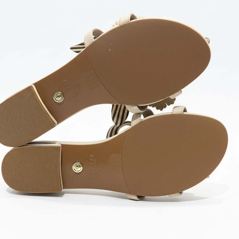 Cecilia tan flower sandal, size 7.5