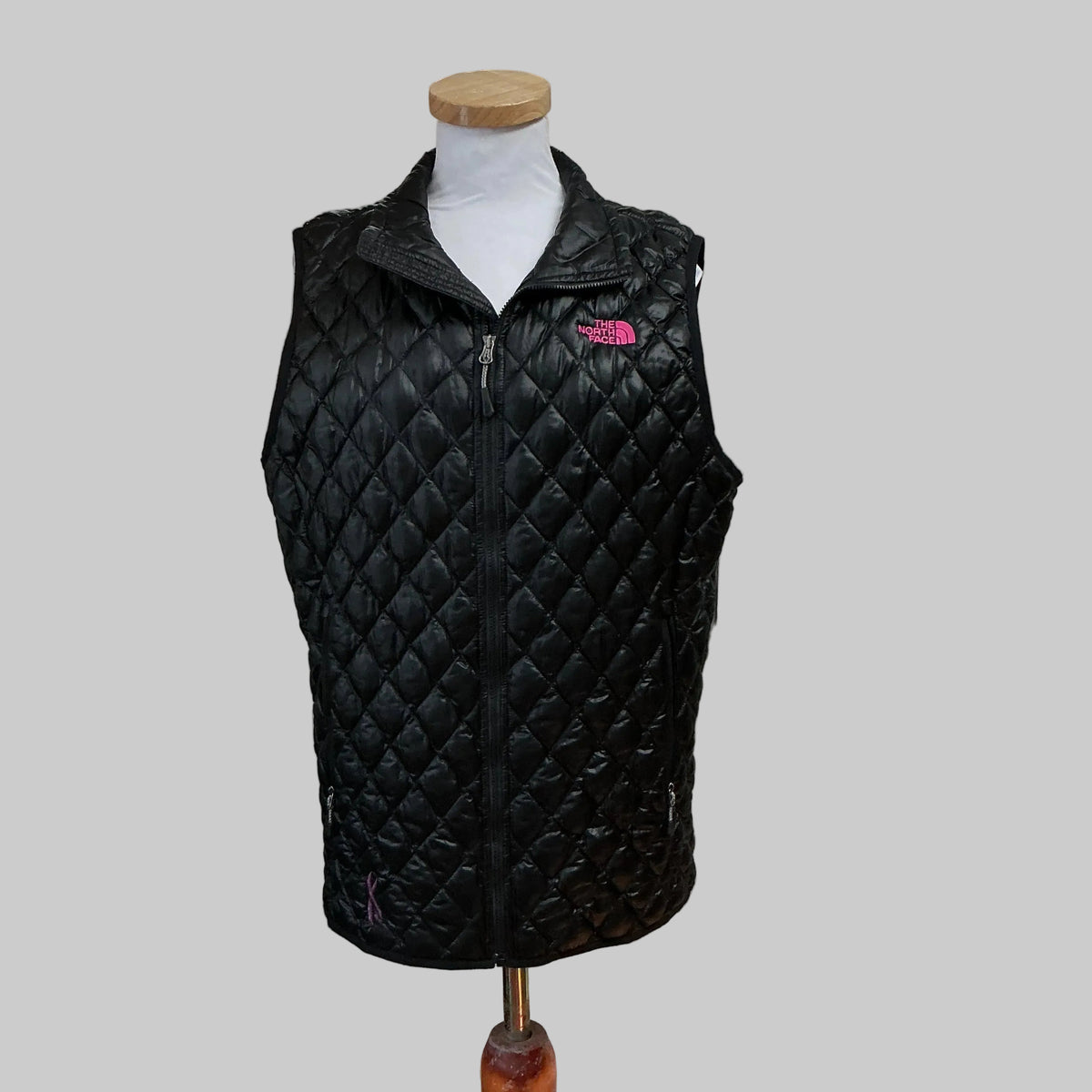 The North Face black puffer vest, size L