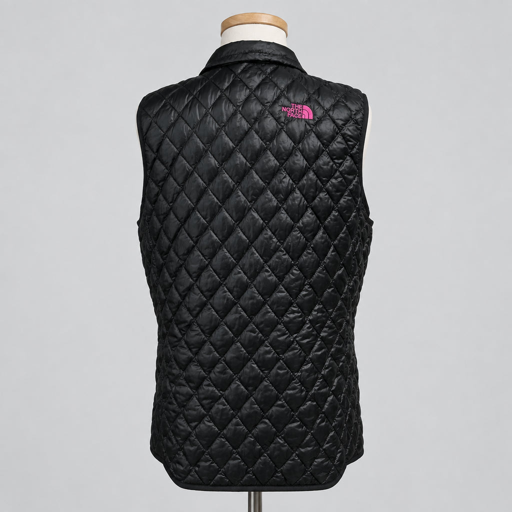 The North Face black puffer vest, size L