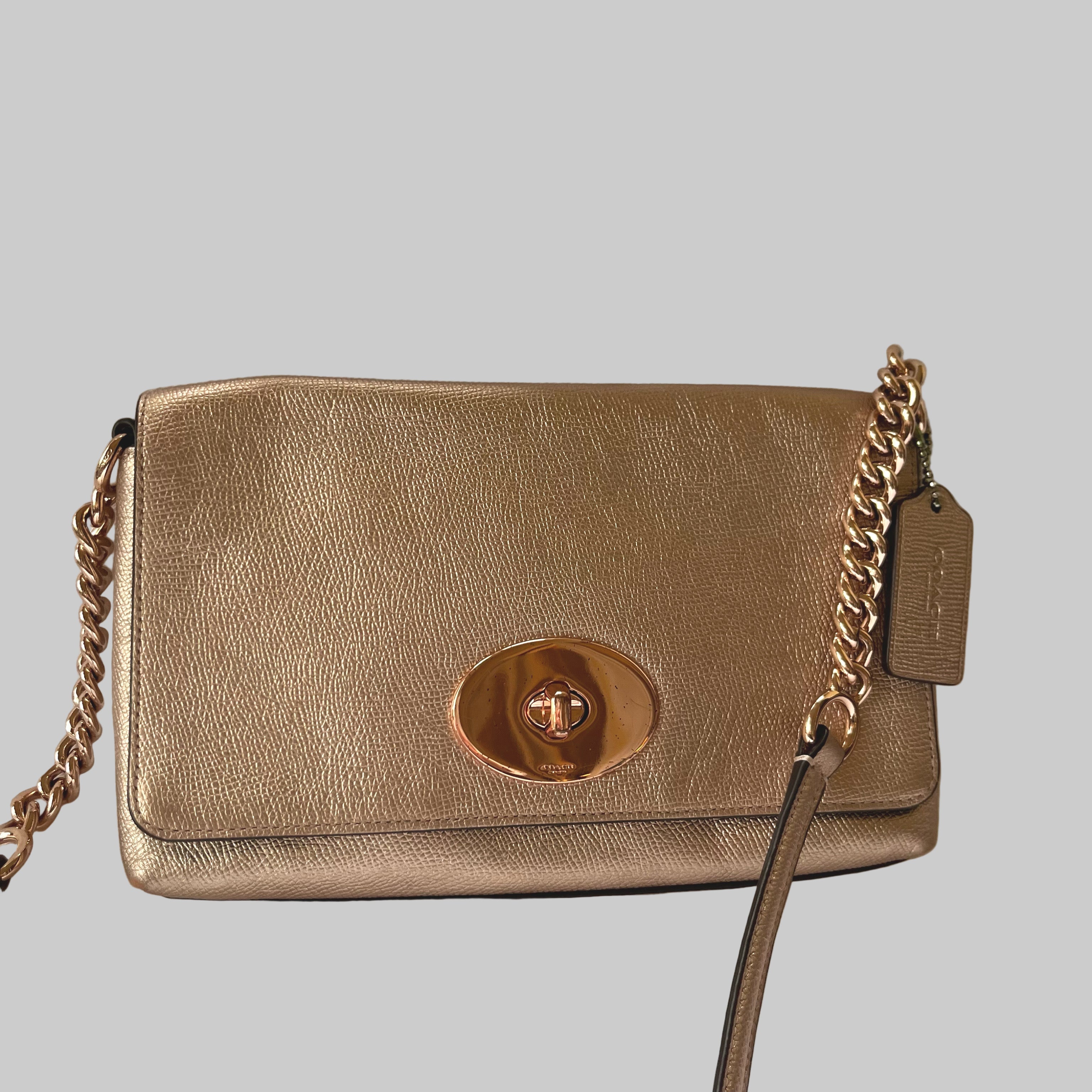 Coach rose gold crossbody bag