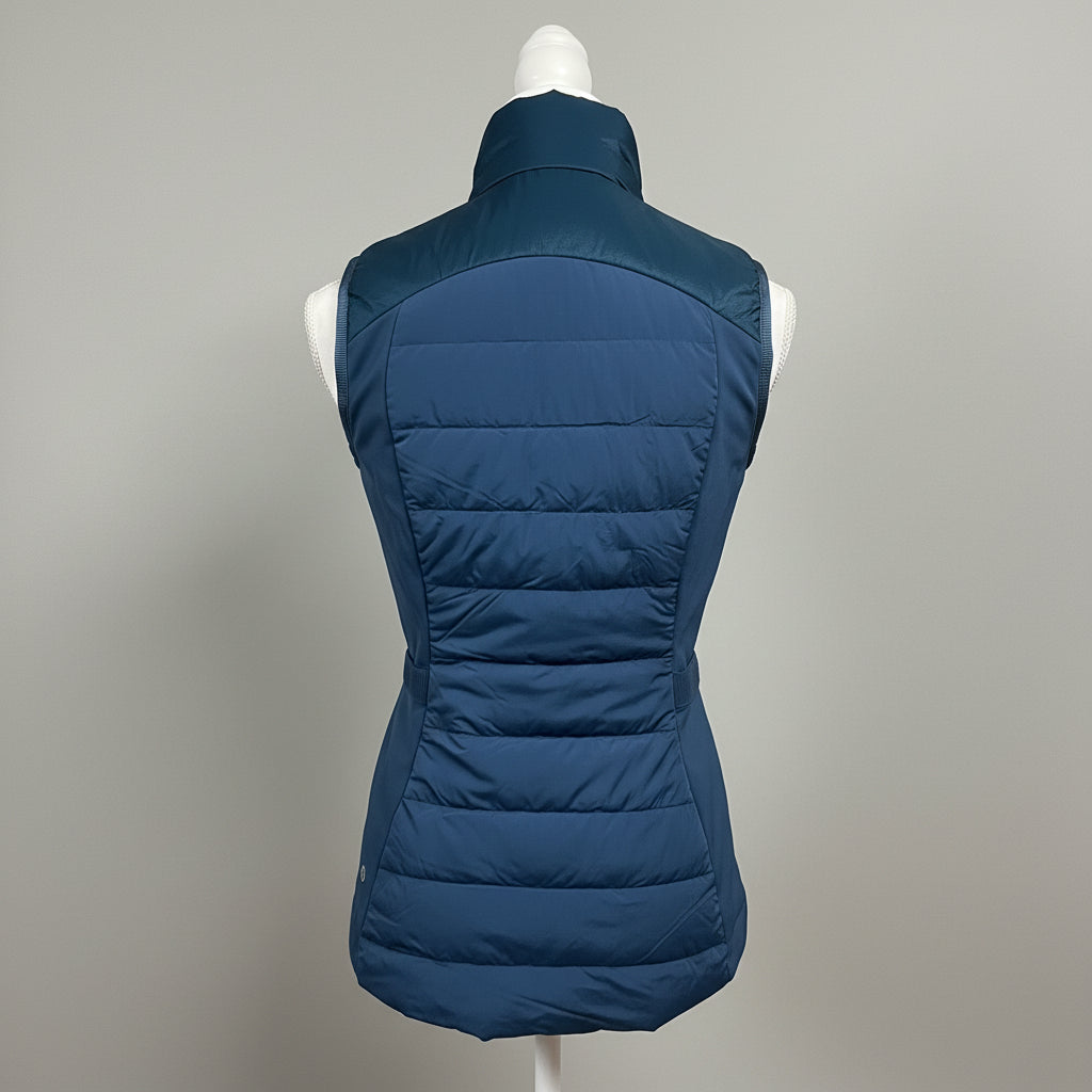 Lululemon teal Down For It All vest, size 6