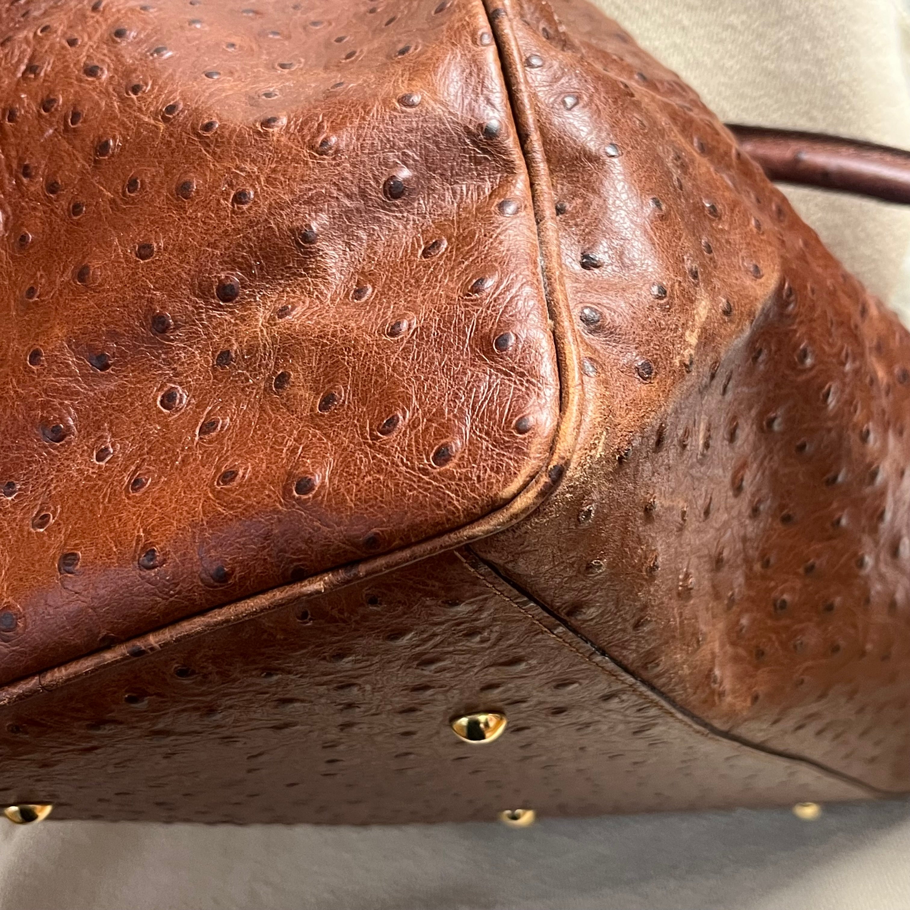 I Santi brown ostrich leather duffle bag