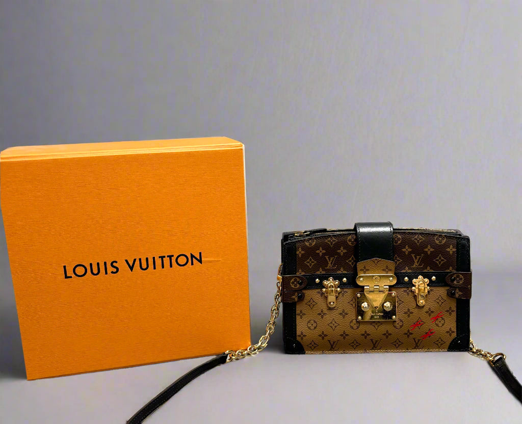 Louis Vuitton brown Trunk Clutch handbag