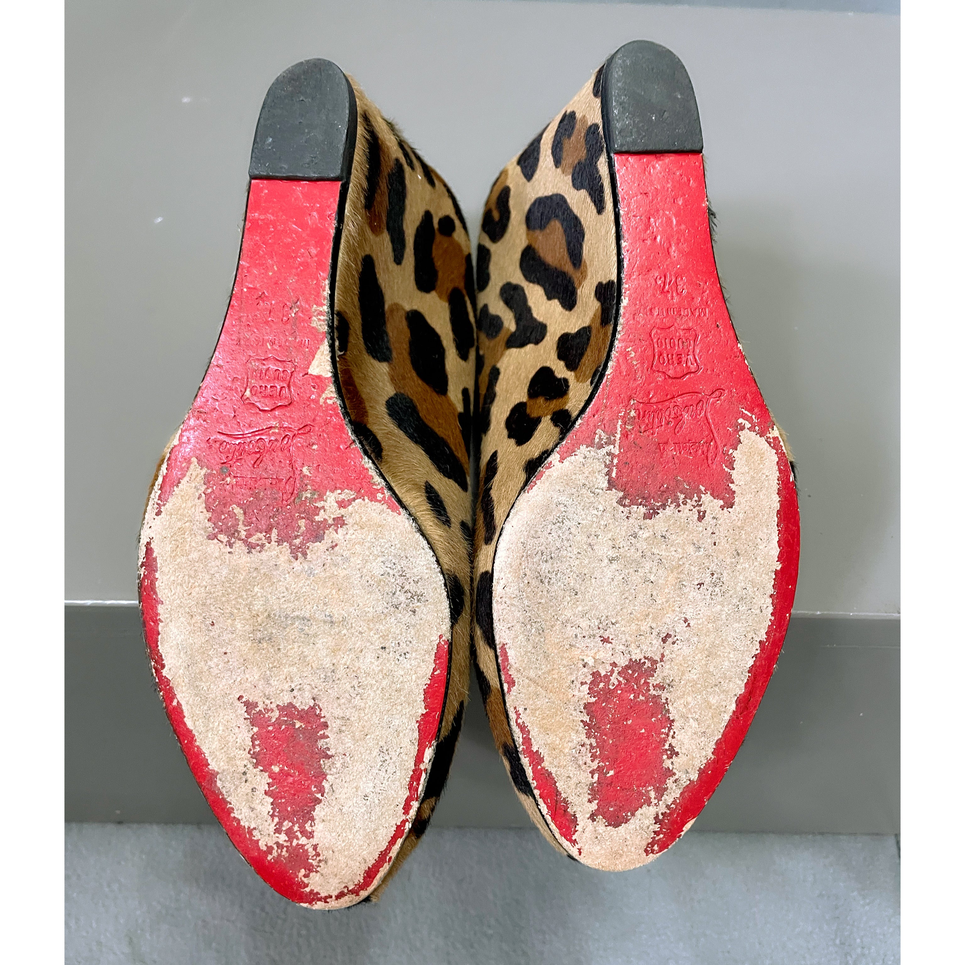 Christian Louboutin leopard pony fur wedge, size 7