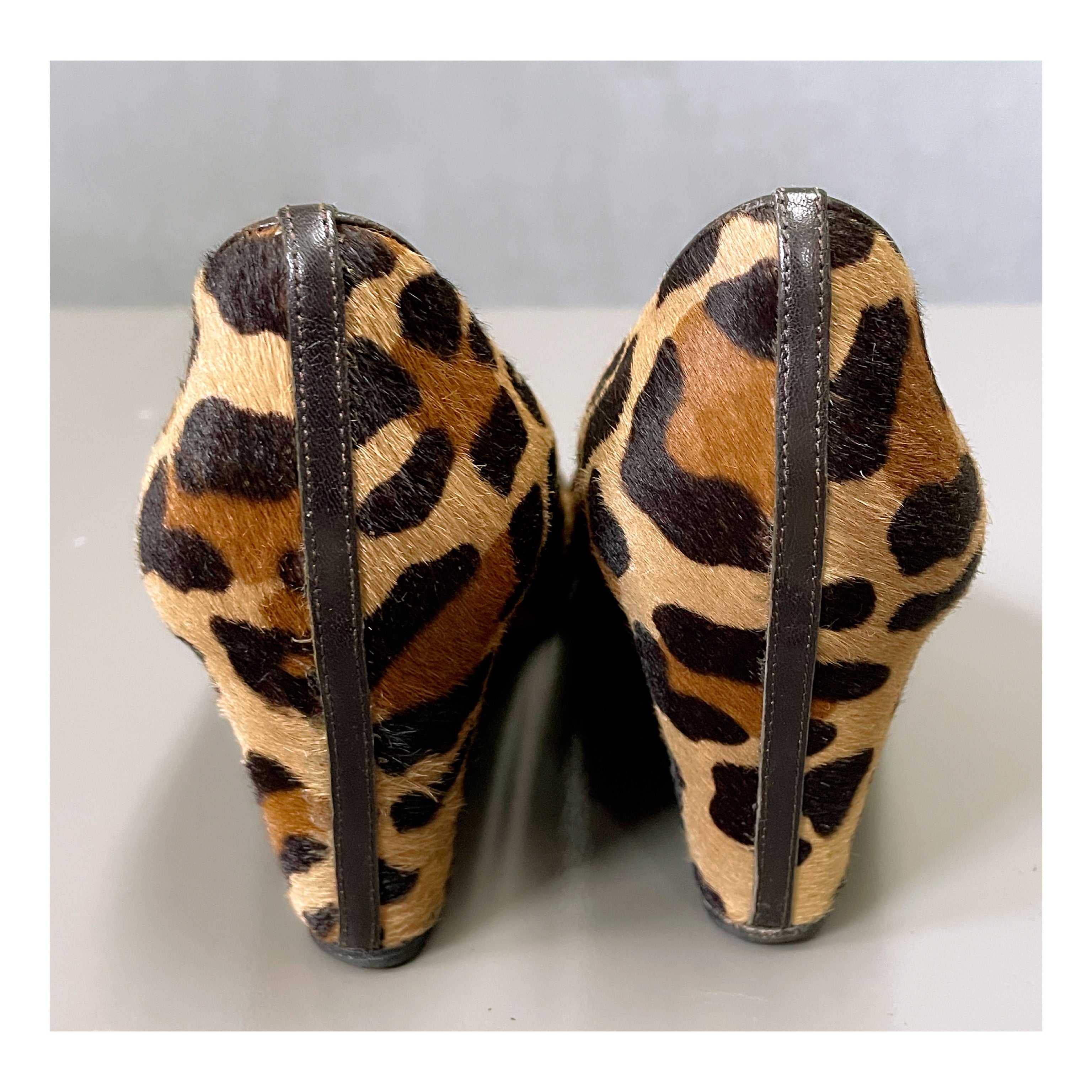 Christian Louboutin leopard pony fur wedge, size 7