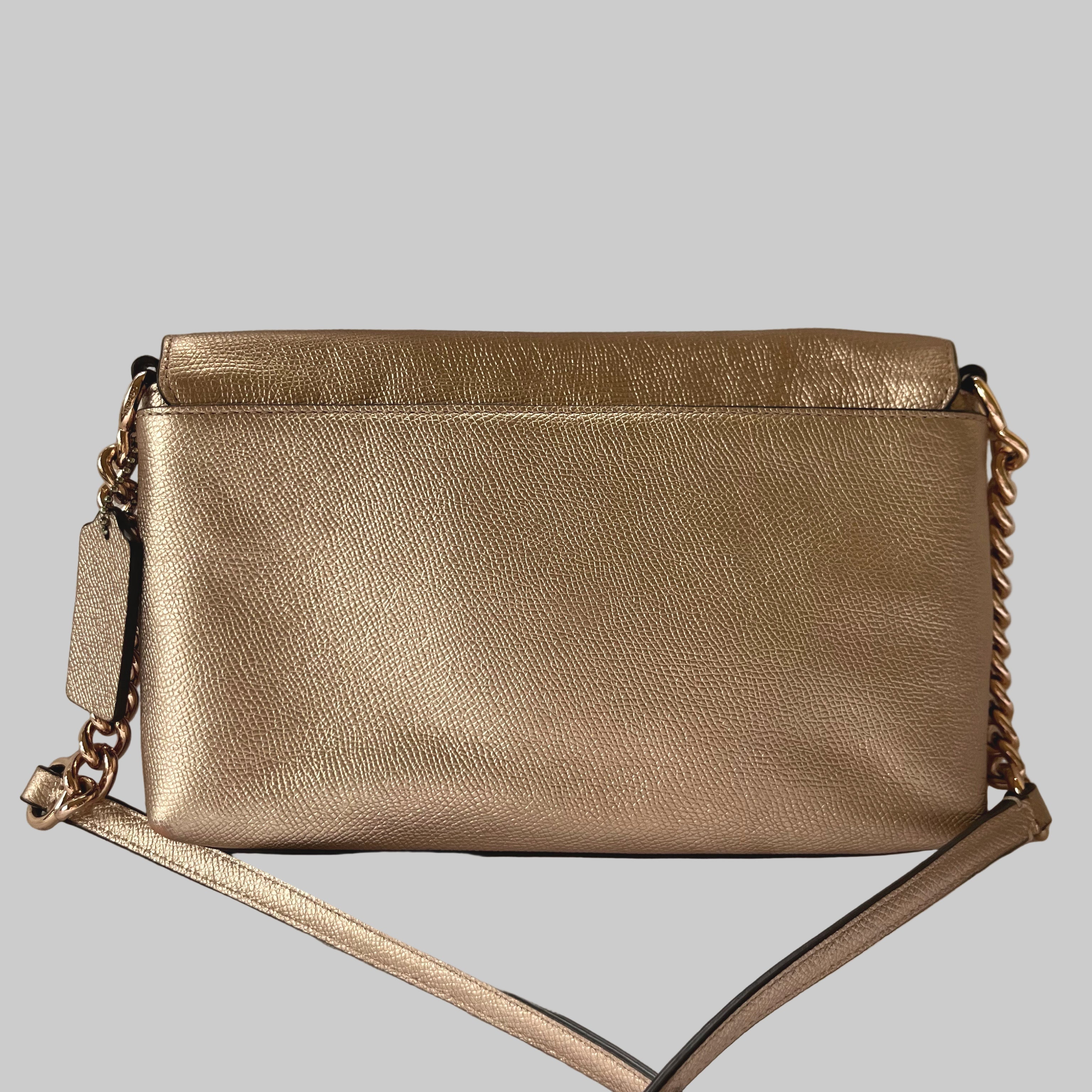 Coach rose gold crossbody bag