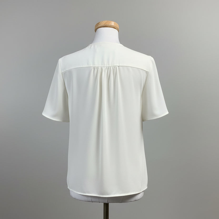 Trina Turk ivory blouse with zipper, size S, NEW WITH TAGS!