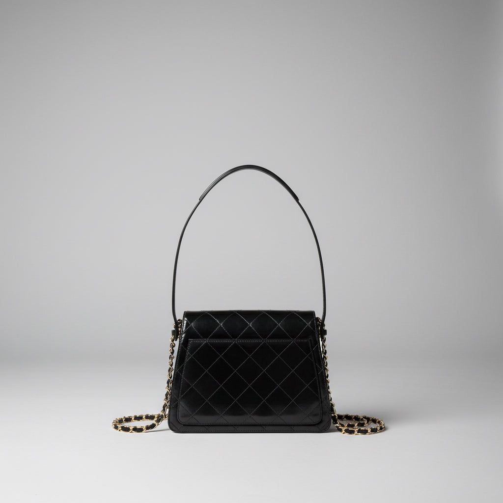 CHANEL vintage black quilted leather bag