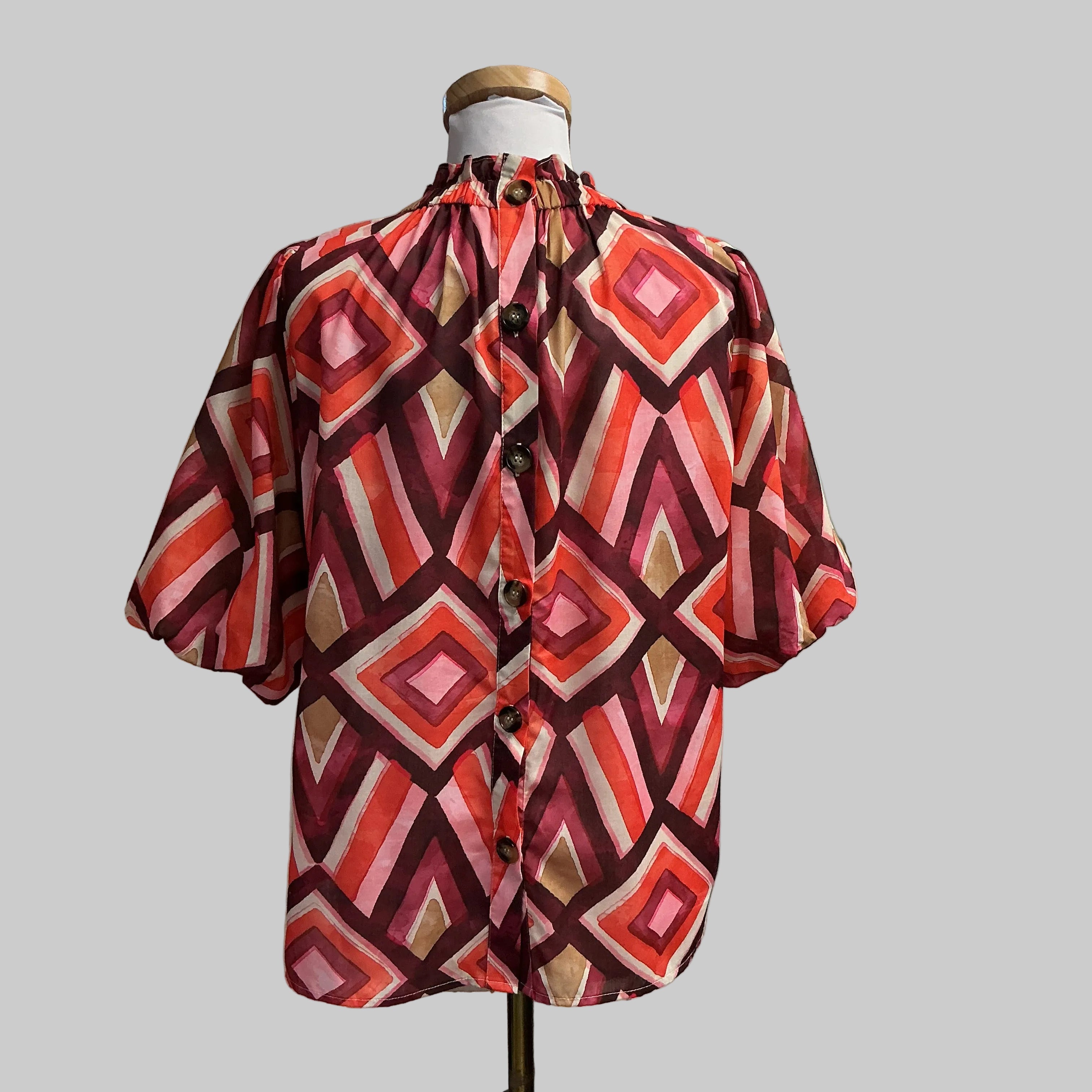 THML wine, orange, and tan print Jemma blouse, size L